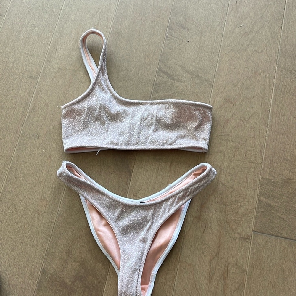 Triangl Light Pink sparkle swimsuit.